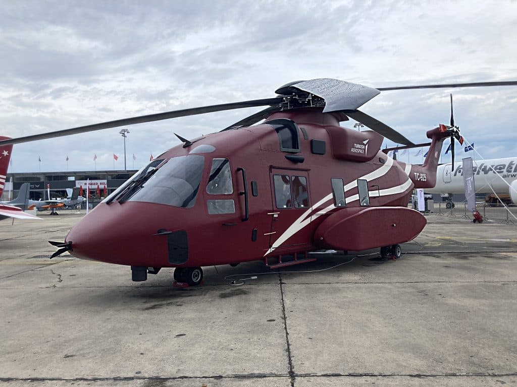 Paris Air Show 2023 trade visitors touring helicopter exhibits