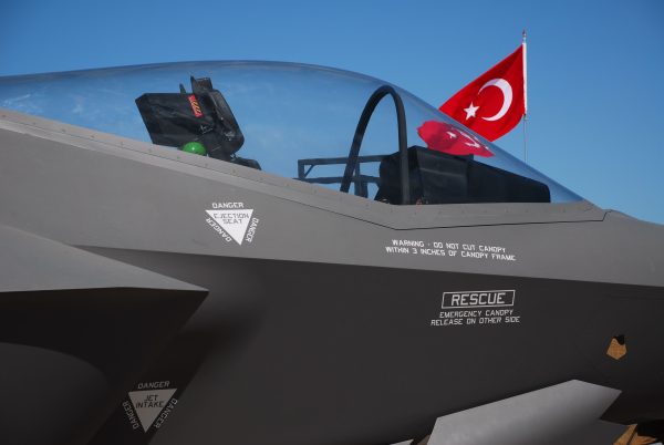 Turkish F-35 stealth jet concept with NATO and Türkiye flags in background