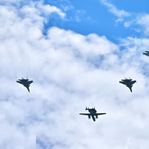 China military parade aviation: J-20 and J-35 in formation over Beijing rehearsals.